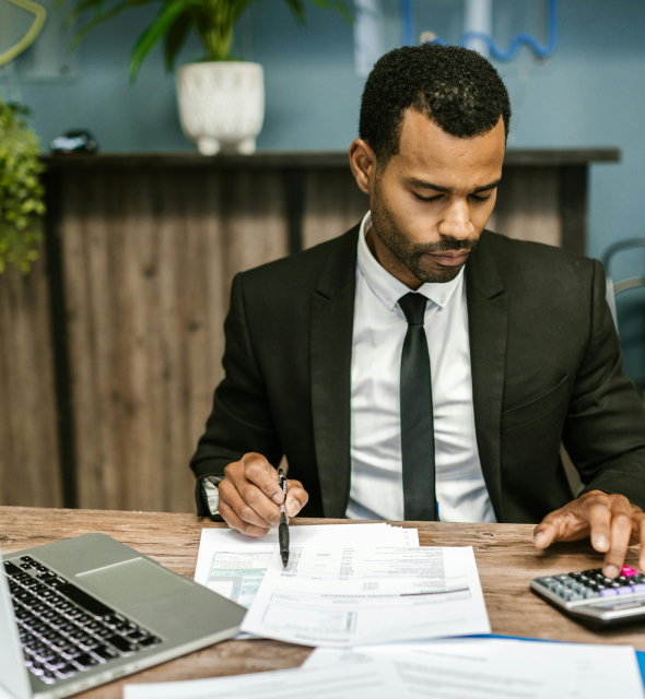 A veterinarian taking care of a cat